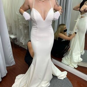 White Sleeveless Plunge Neck Wedding Gown